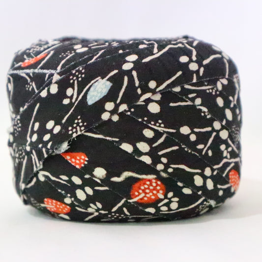 Black with red and light blue leaves and small white flowers, crepe (Y02309021)