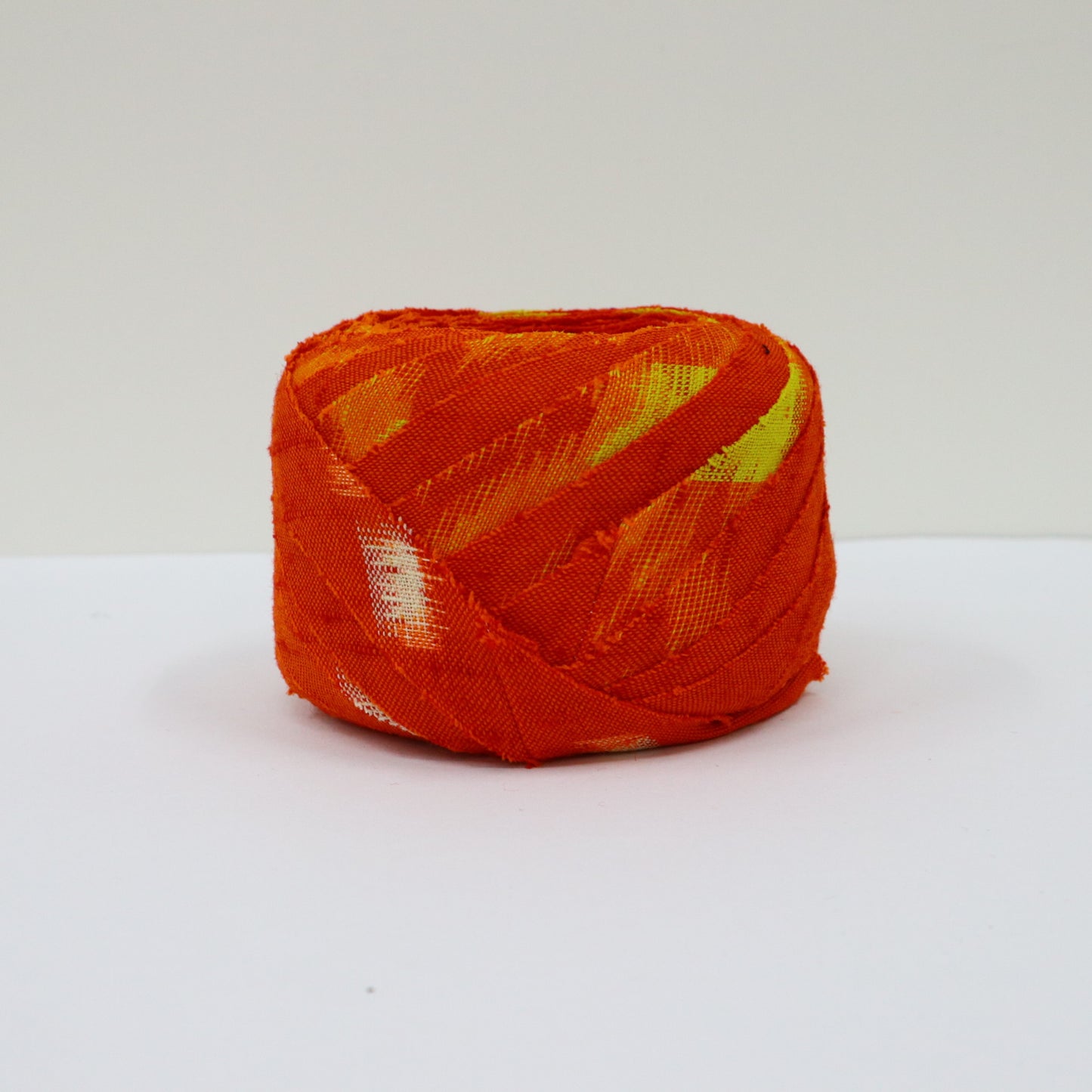 Red-orange with yellow and white kasuri pattern, wool (Y02406001)