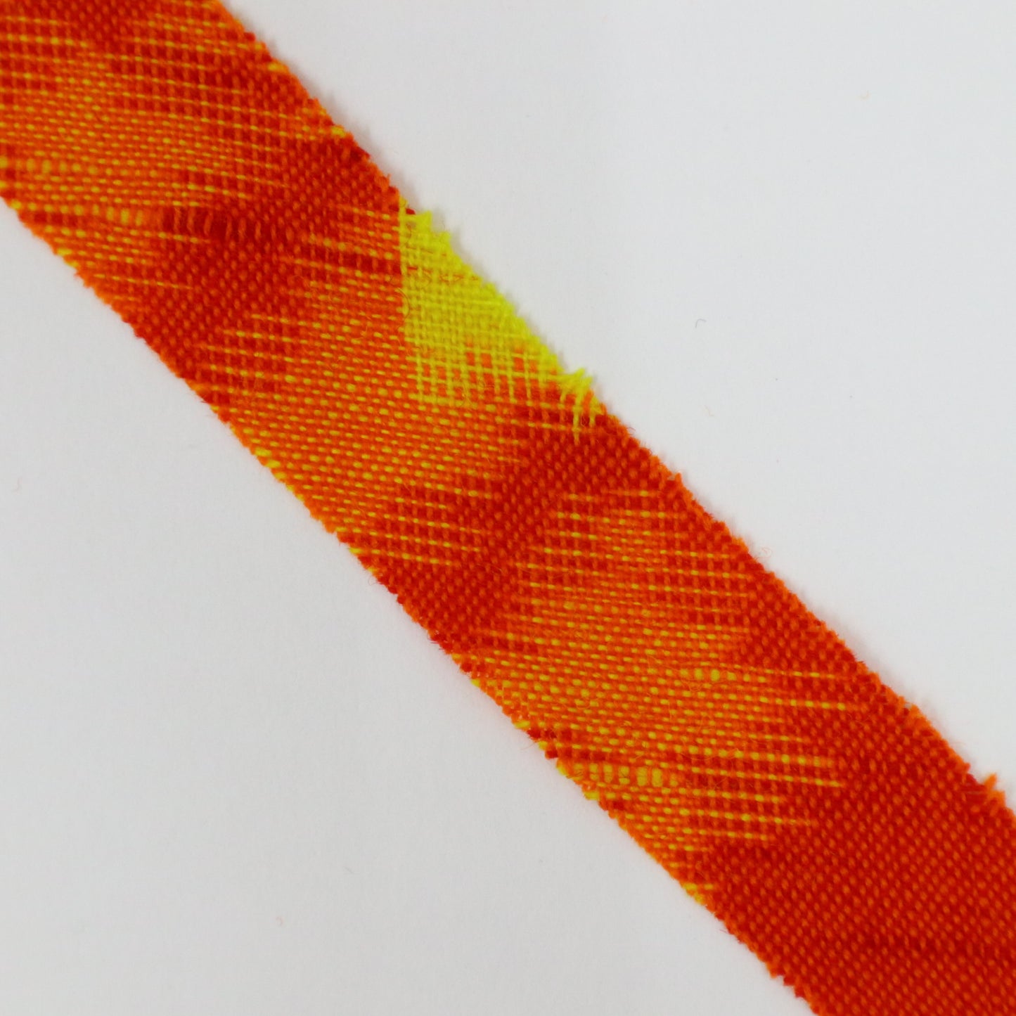 Red-orange with yellow and white kasuri pattern, wool (Y02406001)