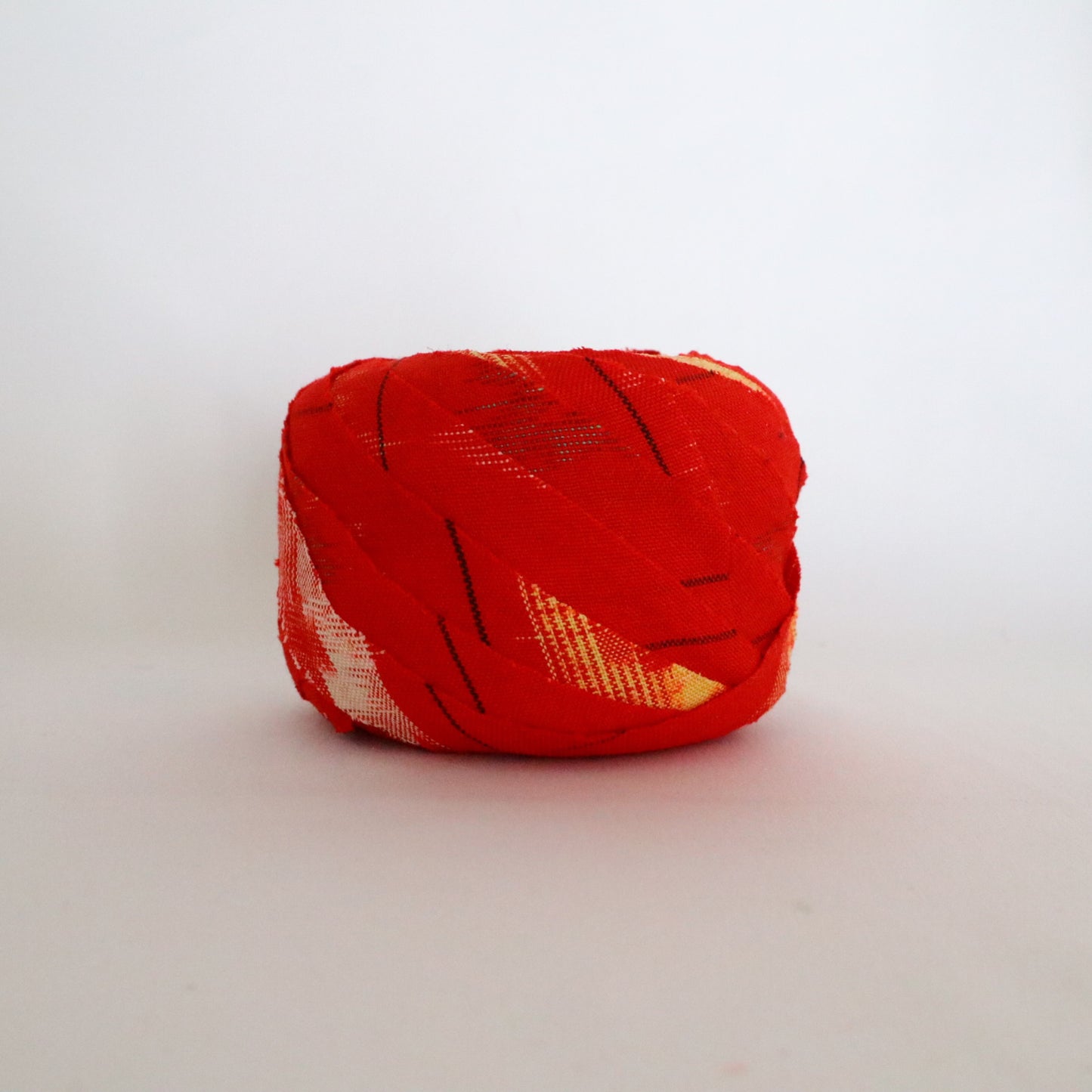 Red with yellow, white, and black ikat pattern, wool (Y02211006)
