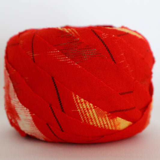 Red with yellow, white, and black ikat pattern, wool (Y02211006)