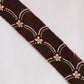 Brown with small flowers and abstract pattern, crepe (Y02310030)