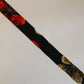 Muslin with red, yellow and green floral pattern on a black background (Y02507003)